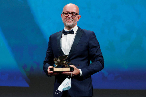 The 77th Venice Film Festival - Awards Ceremony - Venice, Italy, September 12, 2020 -  Head of Marketing of Disney Italy, Davide Romani receives the Golden Lion award on behalf of director Chloe Zhao for Best Film "Nomadland". 