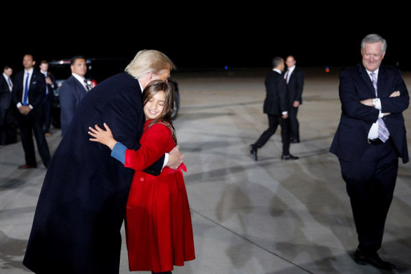 U.S. President Donald Trump hugs his granddaughter, Arabella Kushner, following a campaign rally at Pittsburgh International Airport in Pittsburgh, Pennsylvania, U.S., September 22, 2020.