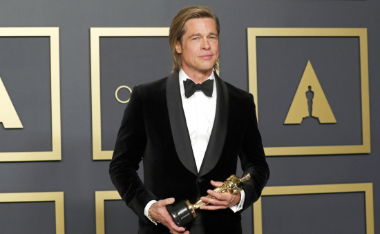 Best Supporting Actor Brad Pitt poses with the Oscar in the photo room during the 92nd Academy Awards in Hollywood, Los Angeles, California